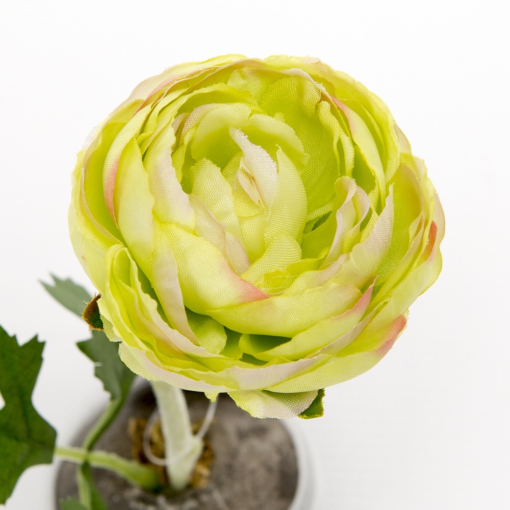 Jarní umělé květiny - Pryskyřník PEBBLES umělý v kulaté váze 19cm zelený