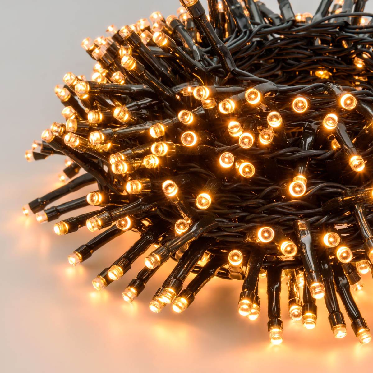 Vánoční světelné řetězy - Řetěz svítící venkovní 1500LED bílá s časovačem, 8 funkcí, černý 30m