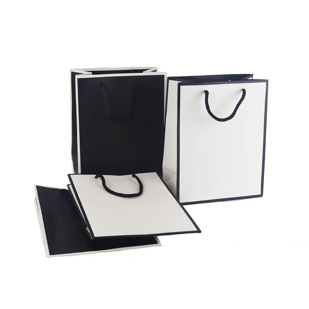 Tašky - Taška dárková papírová bílá/černá mix 23cm